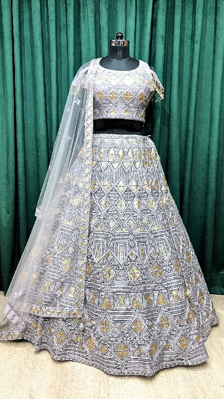 Gray Net Lehenga With Sliver Zari And Gold Sequence Striped unclassified dresses