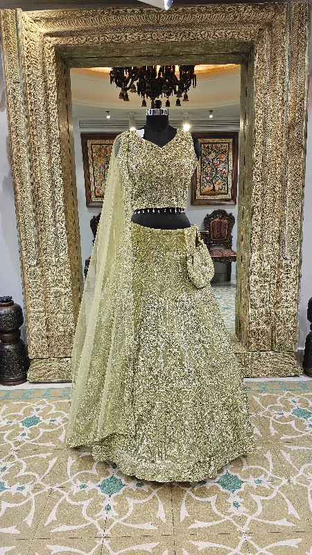 Pista Green Net Lehenga With Pearl, Mirror, Zari and Beads Work Striped unclassified dresses